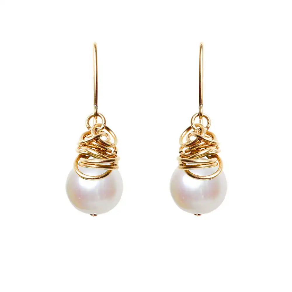 Pearl dangle earrings in 14K gold-fill, warm gold bezel setting with luminous white pearl