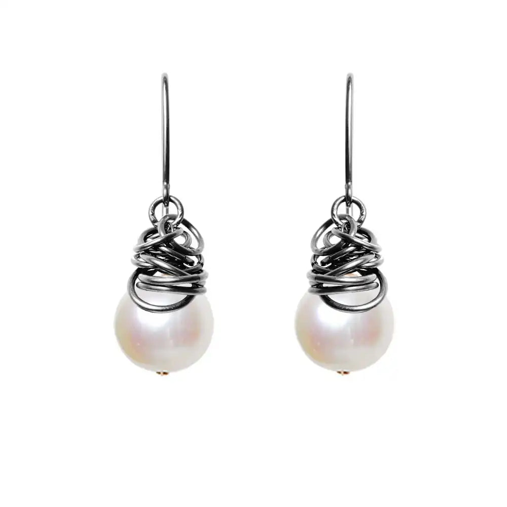 Pearl dangle earrings in oxidized sterling silver, dark setting with luminous freshwater pearl