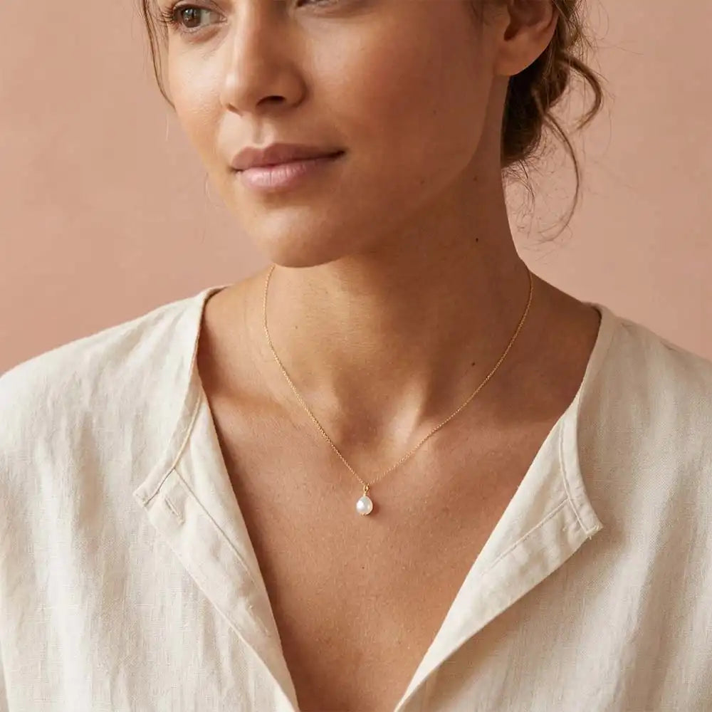 Natural pearl pendant necklace with understated sophistication