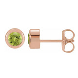 Peridot bezel stud earrings side view in 14K rose gold variant--14K-rose-gold