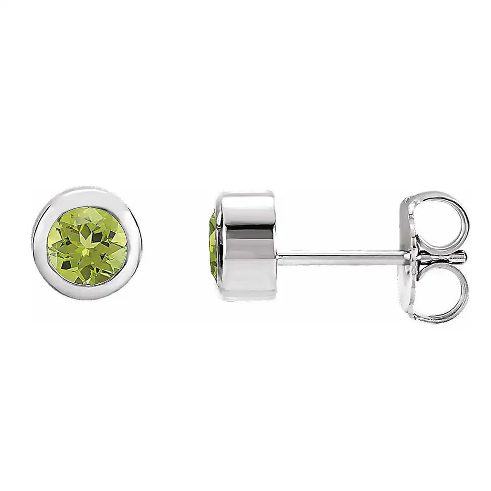 Peridot bezel stud earrings side view in sterling silver