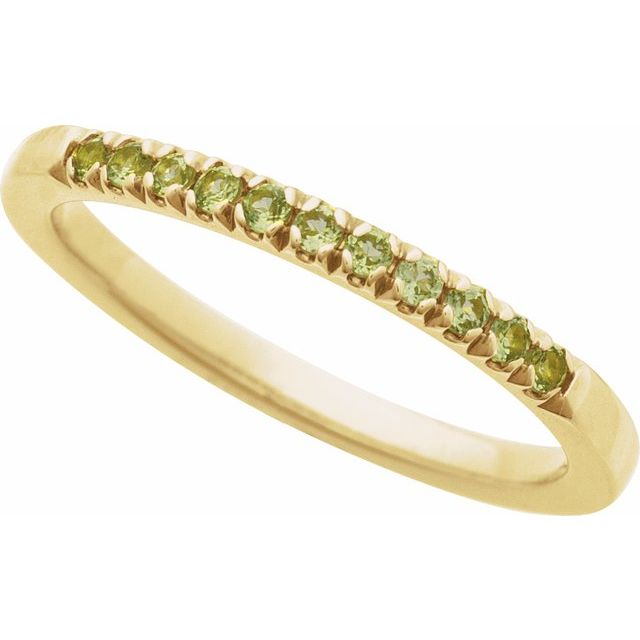 Peridot stacking band with lime-green gems in yellow gold