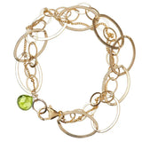 Natural peridot woven chain bracelet in 14K gold-fill, close-up of setting variant--Peridot variant--Gold-fill