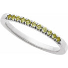 Modern white gold stacking ring with peridot stones