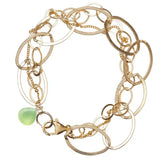 Natural prehnite woven chain bracelet in 14K gold-fill, close-up of setting in sterling silver variant--Gold-fill