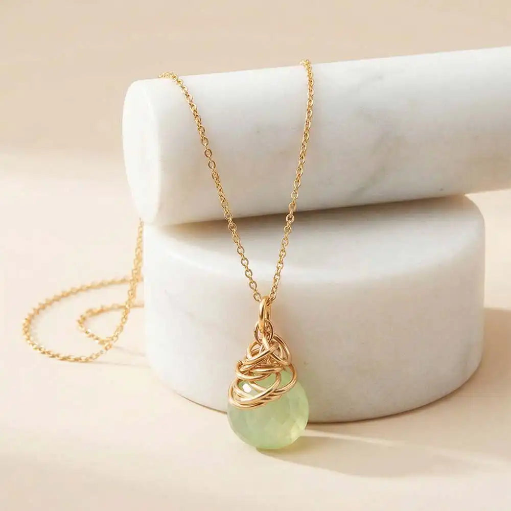 Natural prehnite pendant necklace in sterling silver, styled on chain necklace variant--Gold-fill variant--Rose-Gold-fill variant--Sterling-silver variant--Oxidized-sterling-silver variant--Prehnite