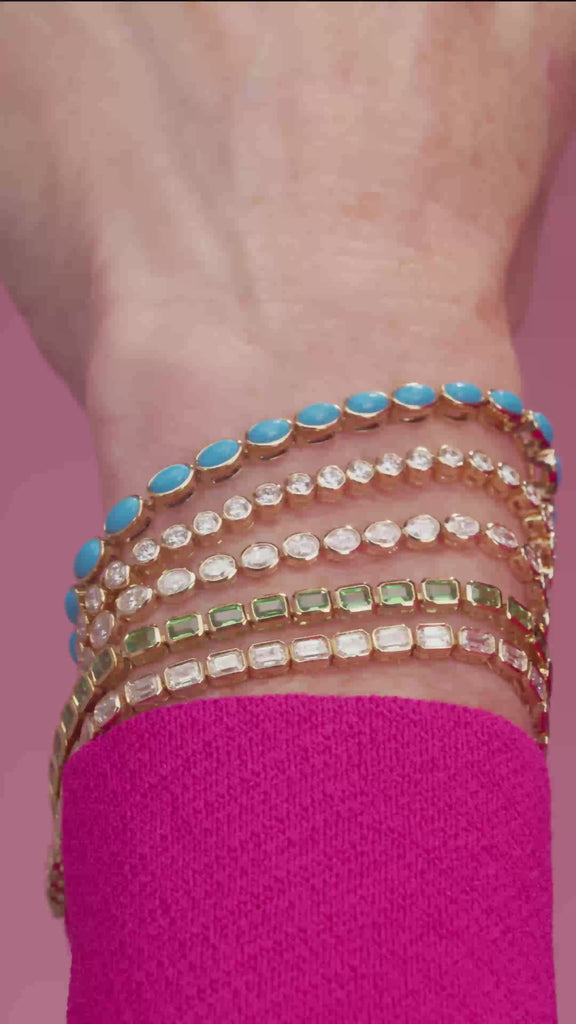 Gemstone tennis bracelet in 14K gold, side angle