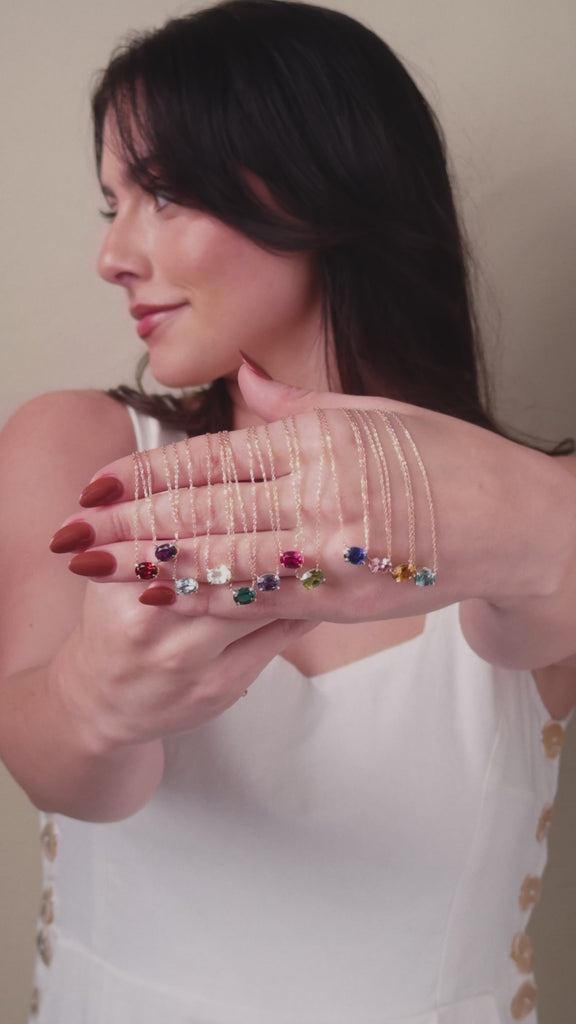 Movie featuring east-west oval birthstone necklaces in all 12 birthstones variant--14K-yellow-gold