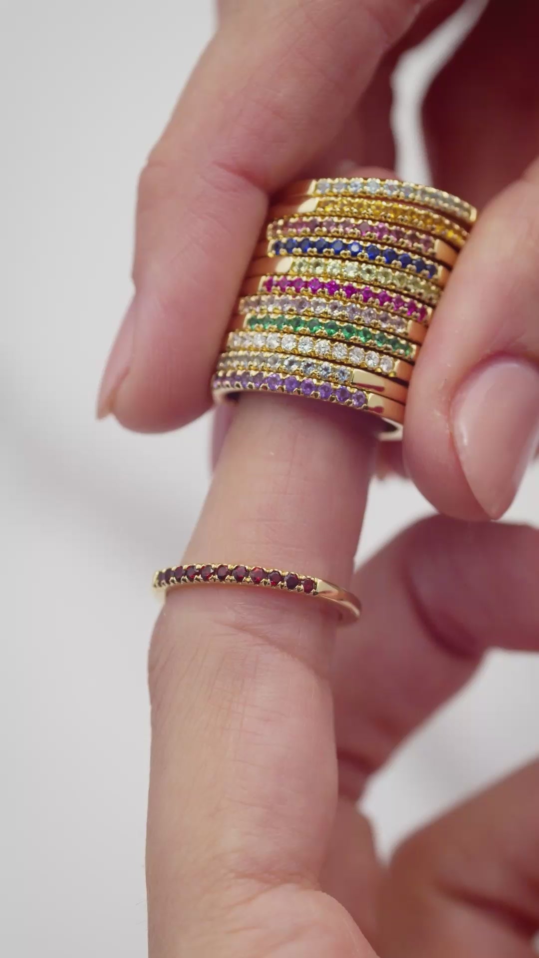 Movie Showing birthstone bands being stacked and played with.