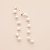 Long grey pearl chain earrings in sterling silver, showing 2.5-inch drop