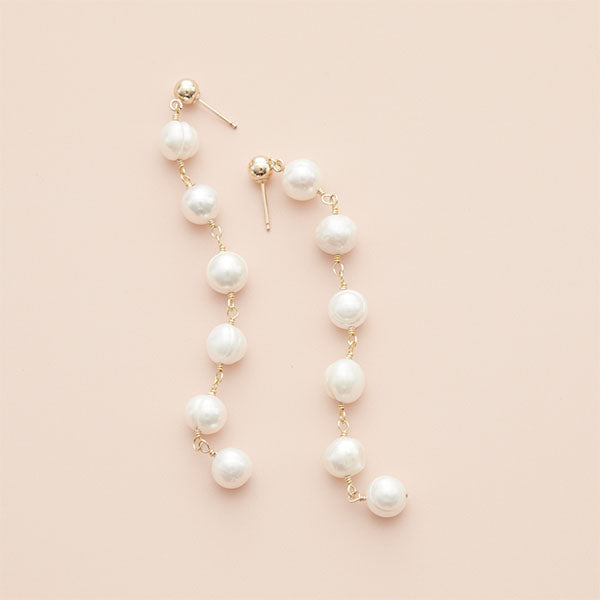 Long grey pearl chain earrings in sterling silver, showing 2.5-inch drop