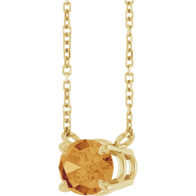 East-west prong-set citrine necklace in yellow gold setting detail