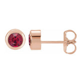Ruby bezel stud earrings side view in 14K rose gold variant--14K-rose-gold