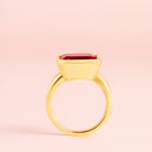 Emerald-cut ruby cocktail ring horizontal setting