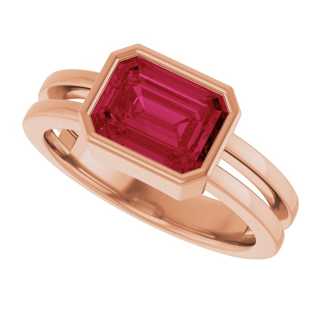 Bezel-set ruby emerald-cut cocktail ring in 14K rose gold, modern heirloom jewelry.