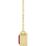 Ruby birthstone necklace in yellow gold, side profile showing east-west setting variant--14K-yellow-gold