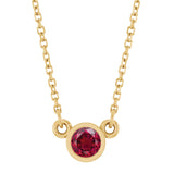 Close-up of 5 mm (~0.65CT) ruby set in 14K yellow gold on 16" chain.