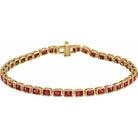 Ruby tennis bracelet 14K gold emerald-cut rubies