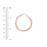4mm gold tube hoop earrings 40mm in 14K rose gold with ruler for scale variant--14K-rose-gold variant--40mm