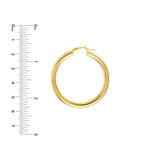 4mm gold tube hoop earrings 40mm in 14K yellow gold with ruler for scale variant--14K-yellow-gold variant--40mm