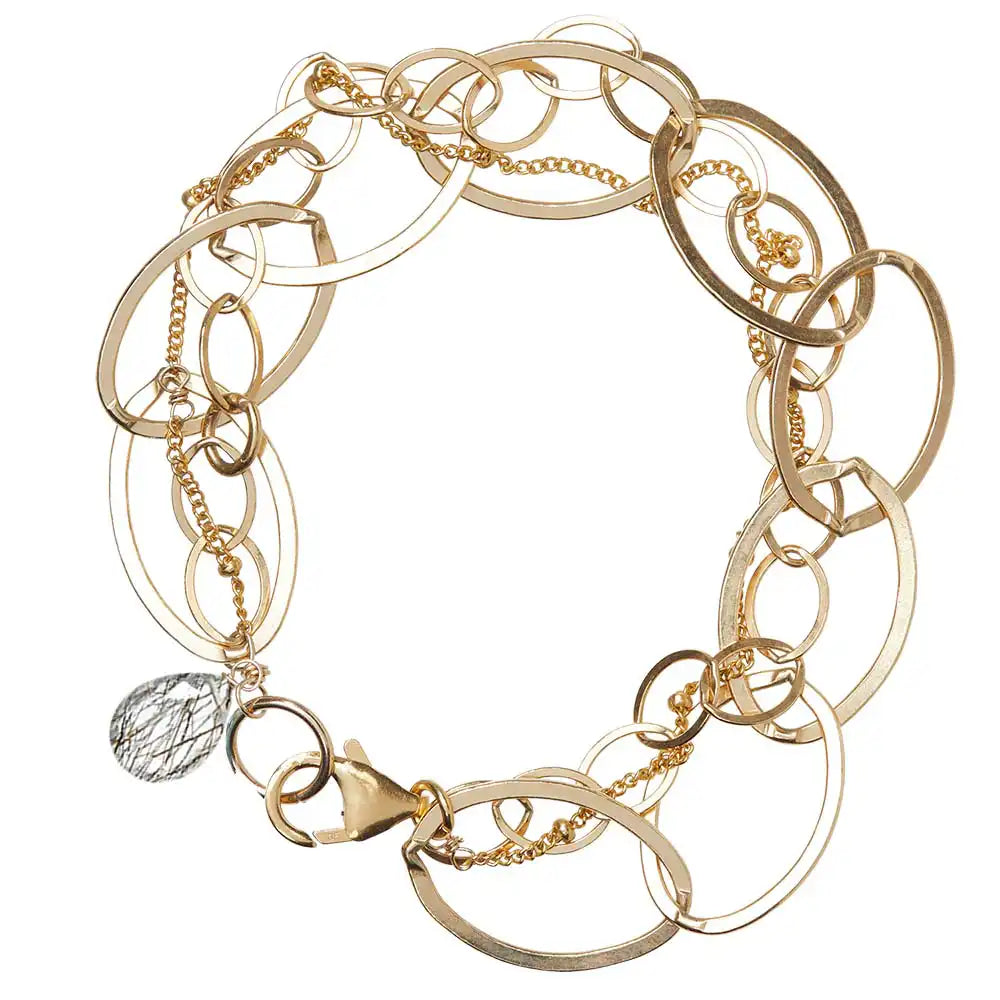 Natural rutilated quartz woven chain bracelet in 14K gold-fill, close-up of setting in sterling silver variant--Gold-fill