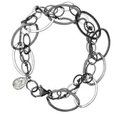 Natural rutilated quartz woven chain bracelet in sterling silver, flat lay on neutral background sterling silver variant--Rutilated-Quartz variant--Oxidized-sterling-silver