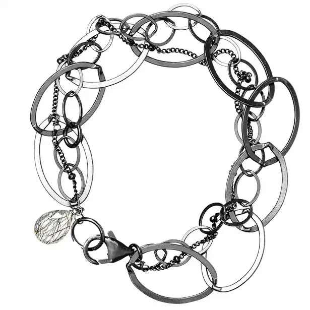 Natural rutilated quartz woven chain bracelet in sterling silver, flat lay on neutral background sterling silver variant--Rutilated-Quartz variant--Oxidized-sterling-silver