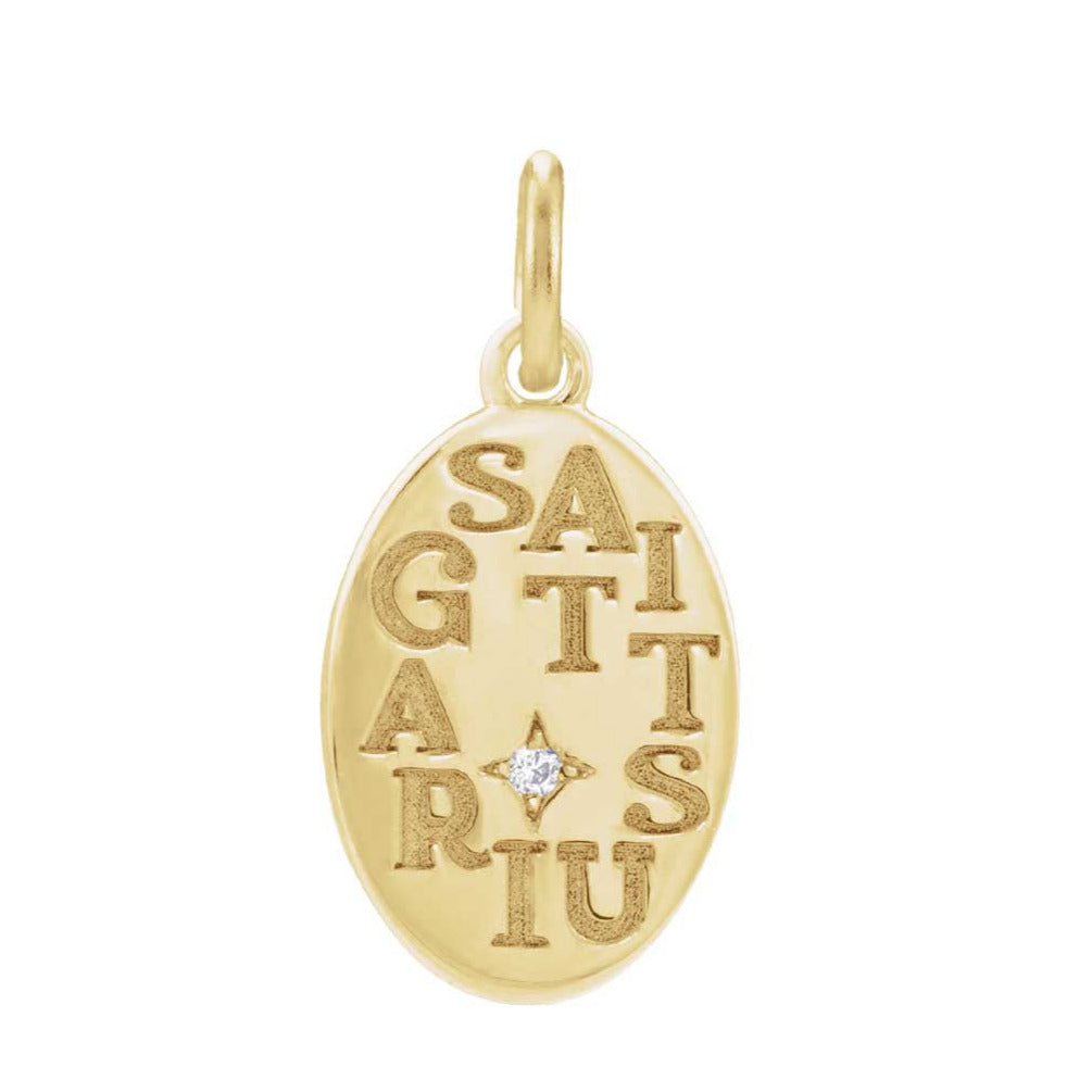 Sagittarius zodiac necklace in 14K gold, on model showing pendant detail