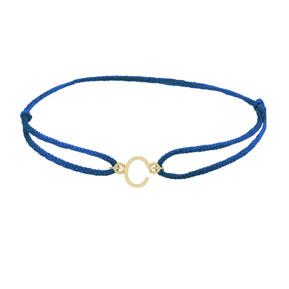 Sans serif initial C silk bracelet in 14K yellow gold on blue silk