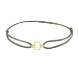 Sans serif initial D silk bracelet in 14K yellow gold on olive silk