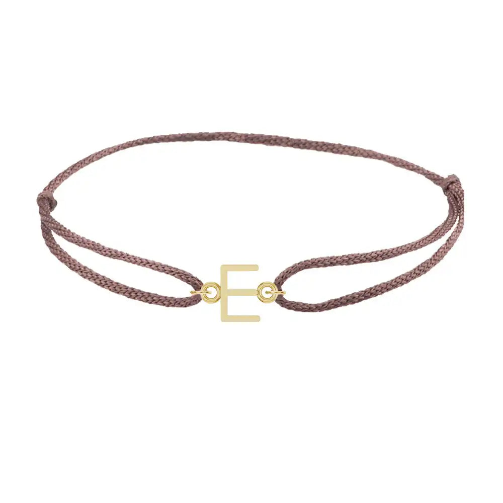 Sans serif initial E silk bracelet in 14K yellow gold on brown silk