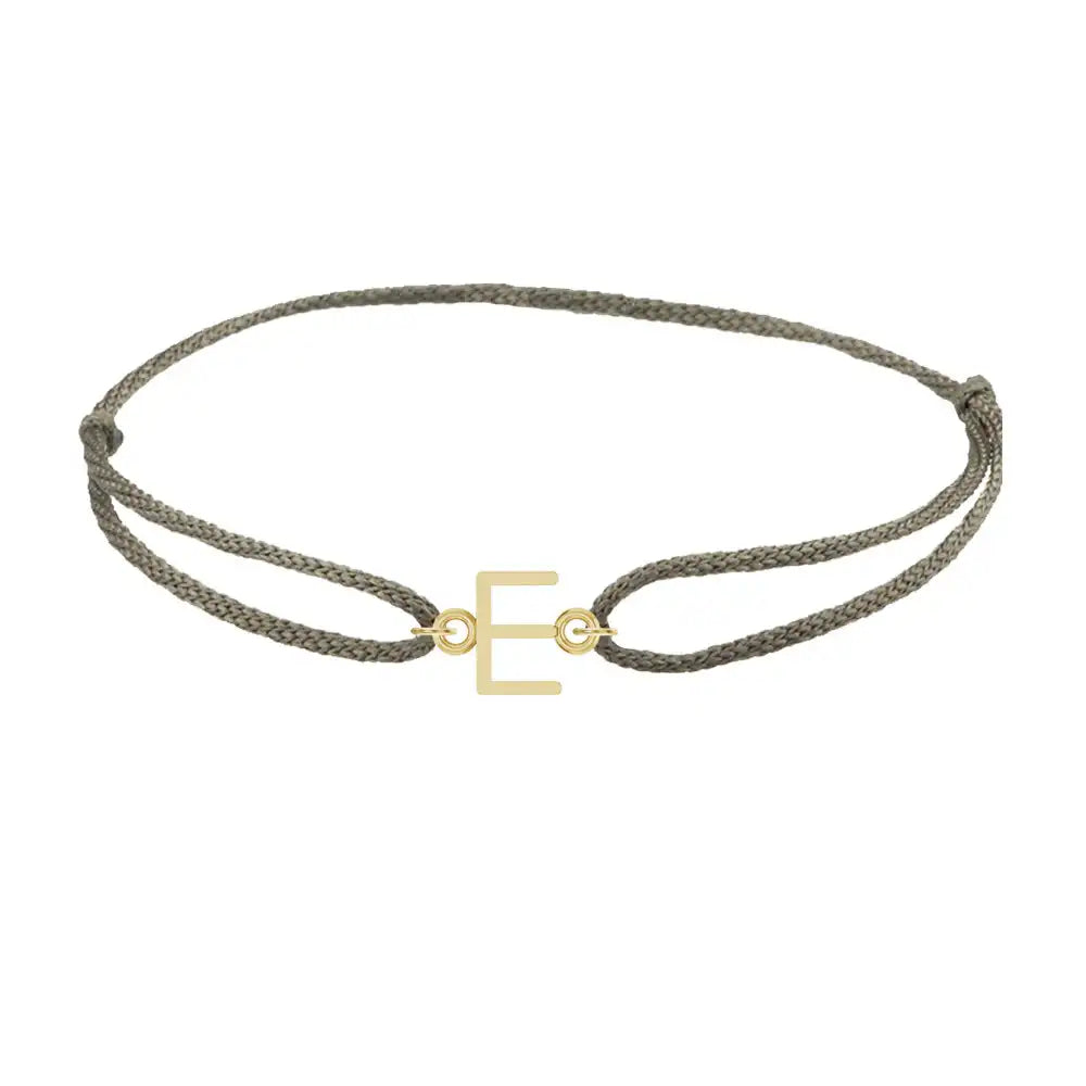 Sans serif initial E silk bracelet in 14K yellow gold on olive silk