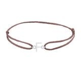 Sans serif initial F silk bracelet in 14K white gold on brown silk