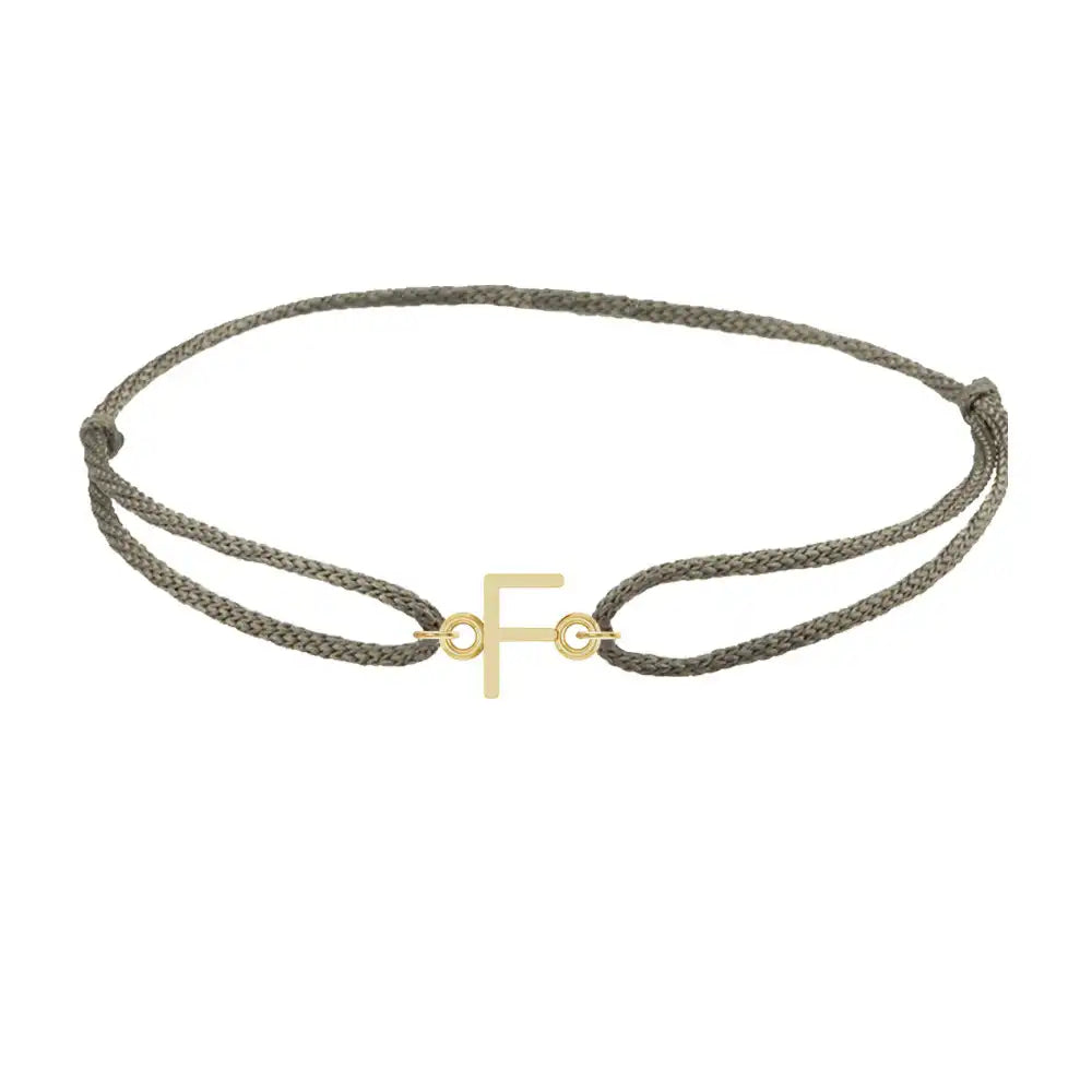 Sans serif initial F silk bracelet in 14K yellow gold on olive silk