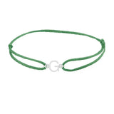 Sans serif initial G silk bracelet in 14K white gold on emerald silk