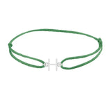 Sans serif initial H silk bracelet in 14K white gold on emerald silk