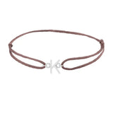 Sans serif initial K silk bracelet in sterling silver on brown silk