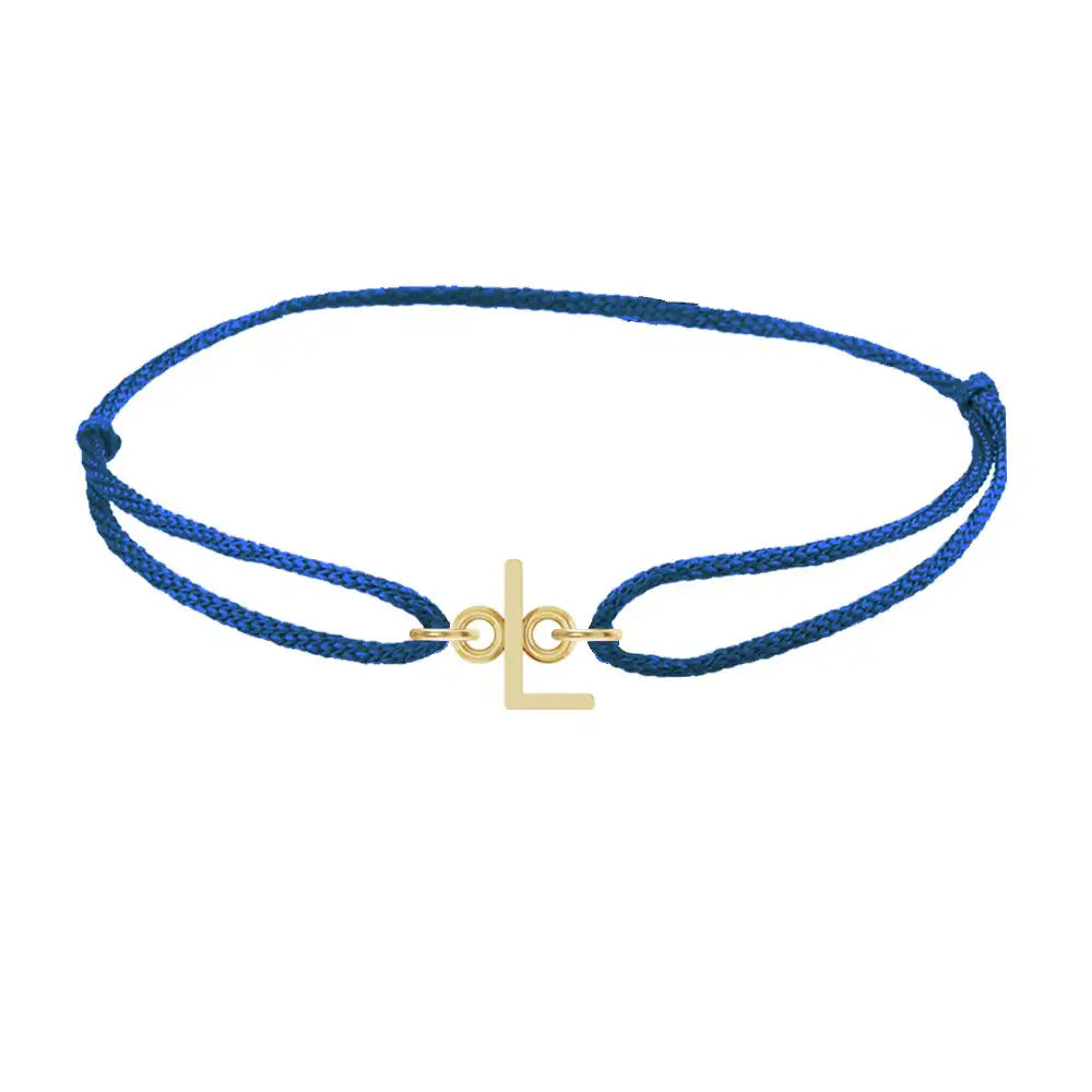 Sans serif initial L silk bracelet in 14K yellow gold on blue silk