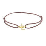 Sans serif initial L silk bracelet in 14K yellow gold on brown silk