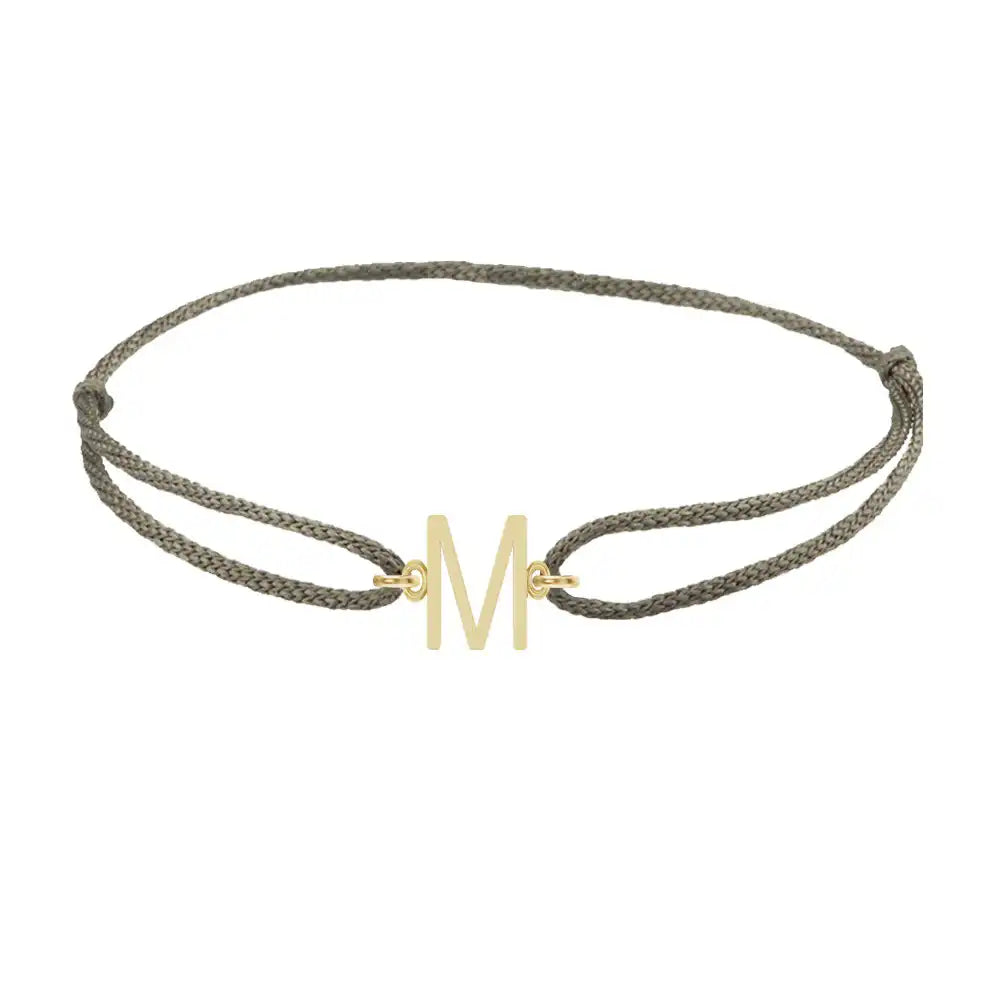 Sans serif initial M silk bracelet in 14K yellow gold on olive silk