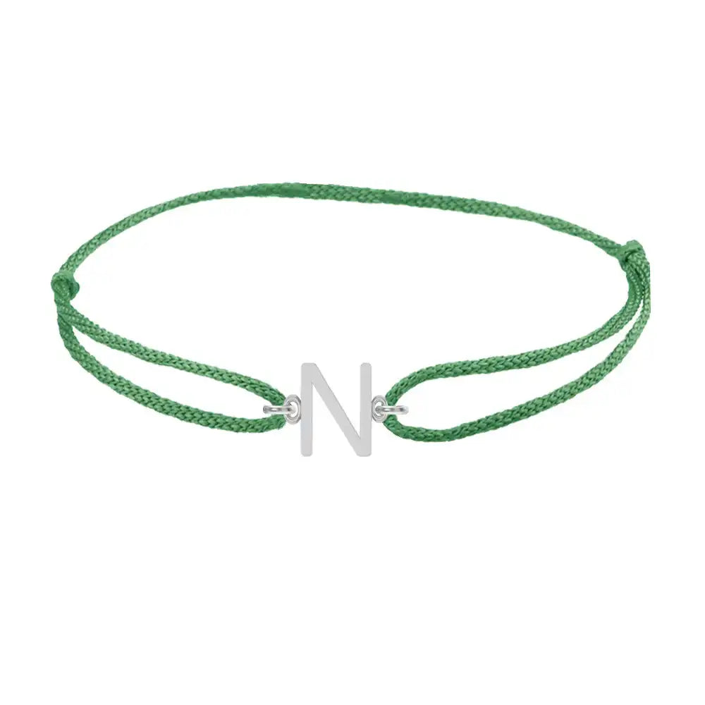 Sans serif initial N silk bracelet in 14K white gold on emerald silk