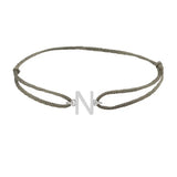 Sans serif initial N silk bracelet in sterling silver on olive silk