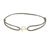 Sans serif initial P silk bracelet in 14K yellow gold on olive silk