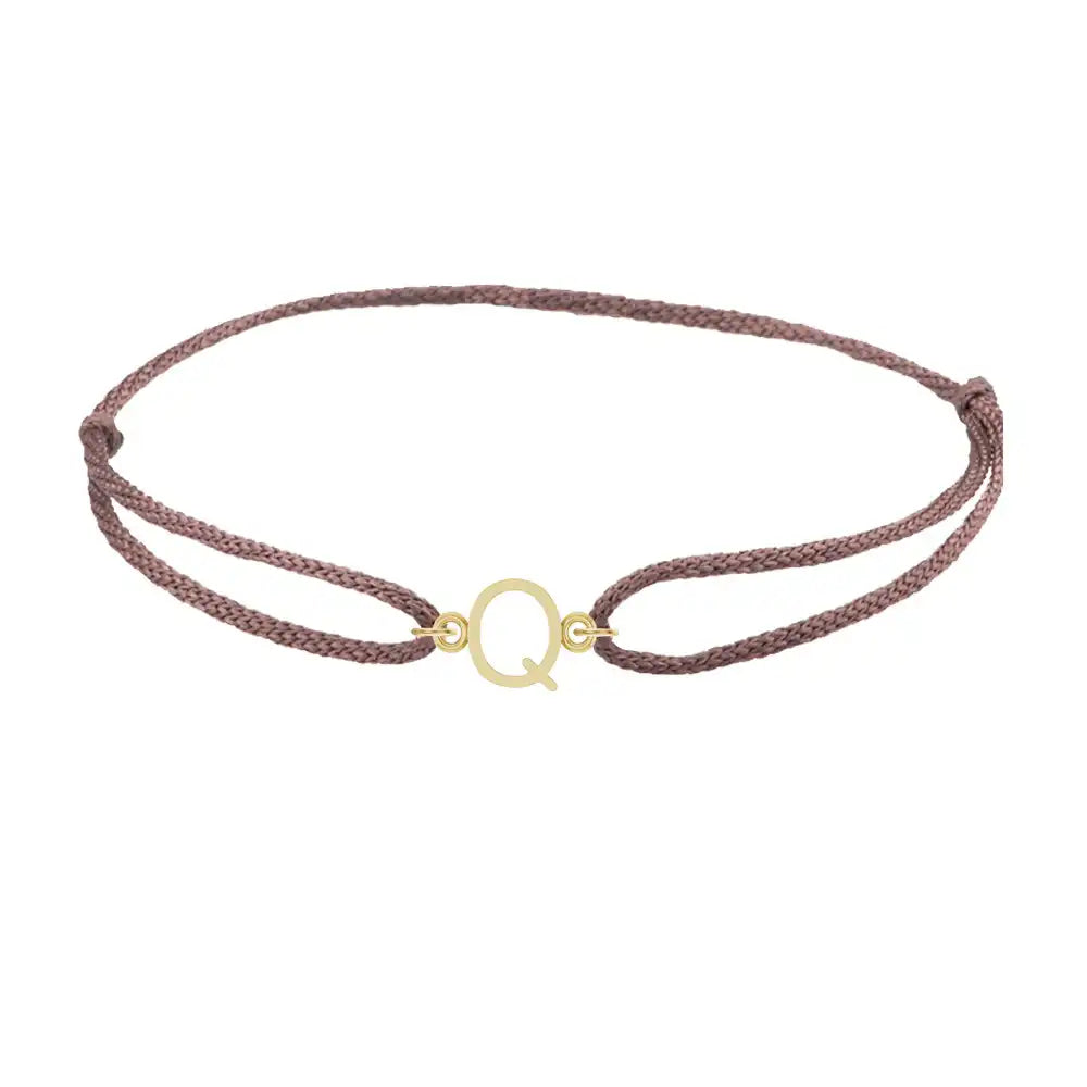 Sans serif initial Q silk bracelet in 14K yellow gold on brown silk