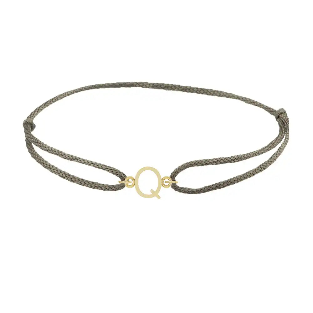 Sans serif initial Q silk bracelet in 14K yellow gold on olive silk