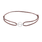Sans serif initial S silk bracelet in 14K white gold on brown silk