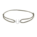 Sans serif initial U silk bracelet in 14K white gold on olive silk
