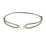 Sans serif initial U silk bracelet in 14K yellow gold on olive silk
