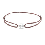 Sans serif initial Z silk bracelet in sterling silver on brown silk