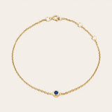 Bezel-set sapphire bracelet in yellow gold, close-up of stone setting yellow gold variant--14K-yellow-gold variant--Sapphire